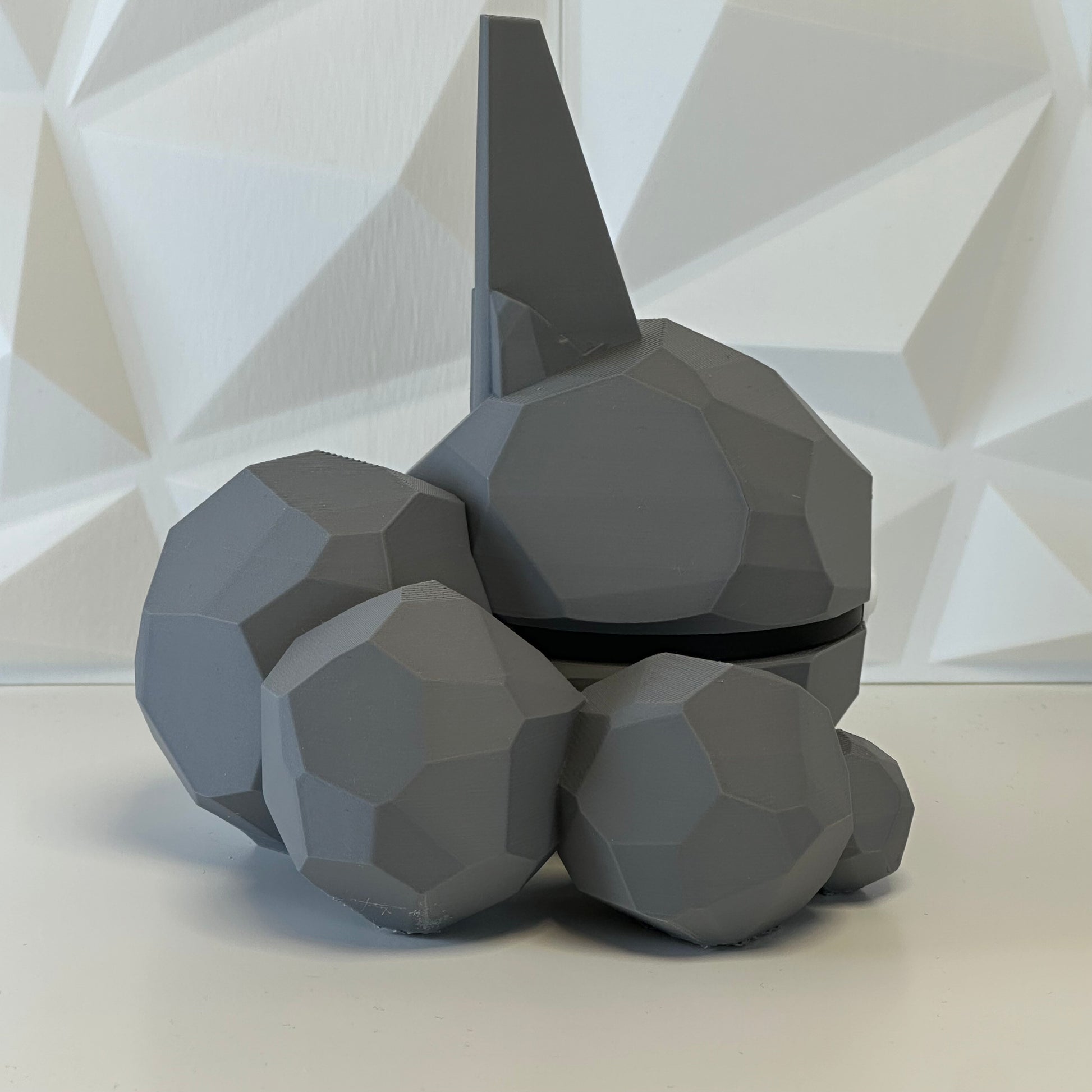 Detalle de la Pokéball Onix mostrando textura y colores