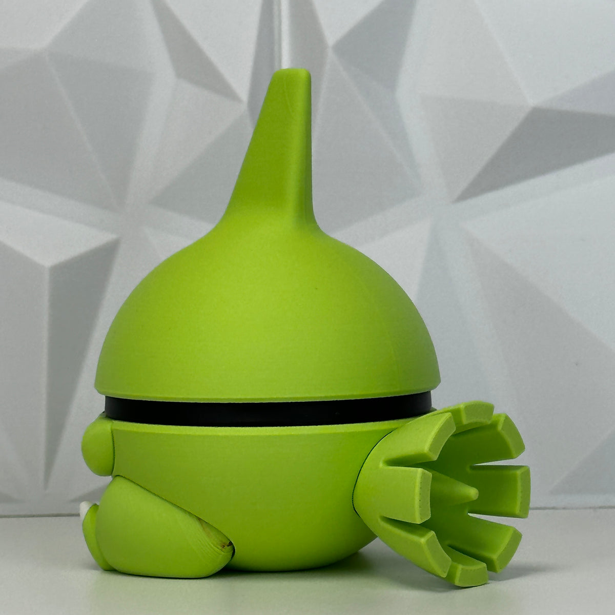 Figura verde vista posterior lateral