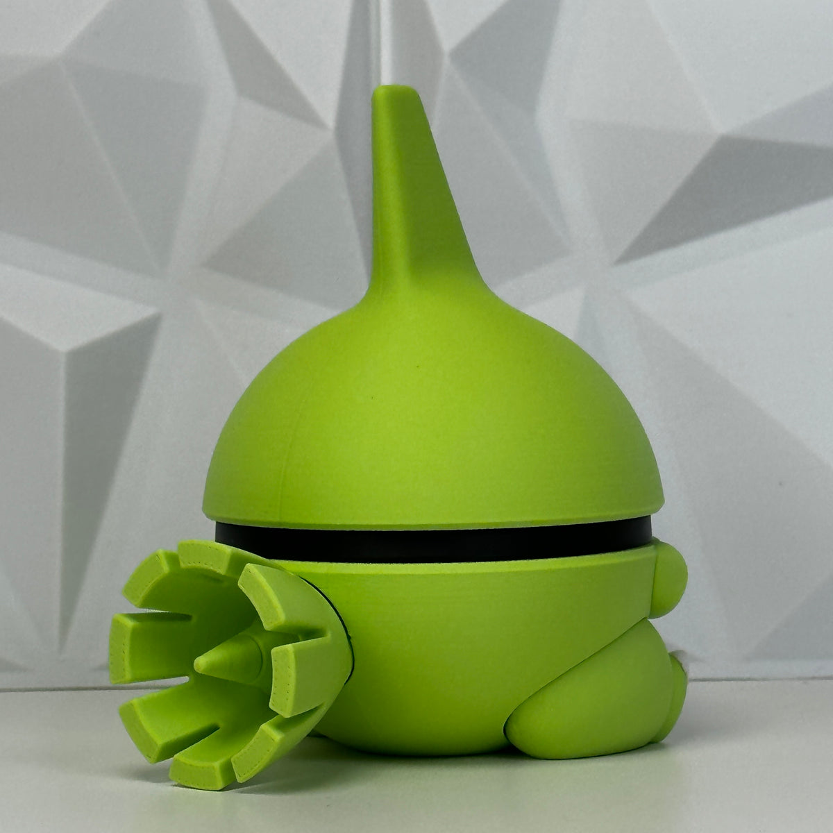 Figura verde vista trasera
